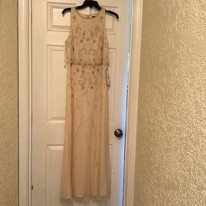 Light pink/creamy color. NWT.